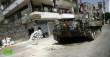 القوات السورية تحاصر درعا وتشن حملة اعتقالات واسعة 