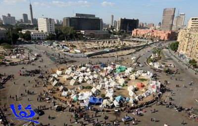 مواجهات دامية في ميدان التحرير.. ومرسي يصدر قانوناً يلزم ب«الموطن الانتخابي»